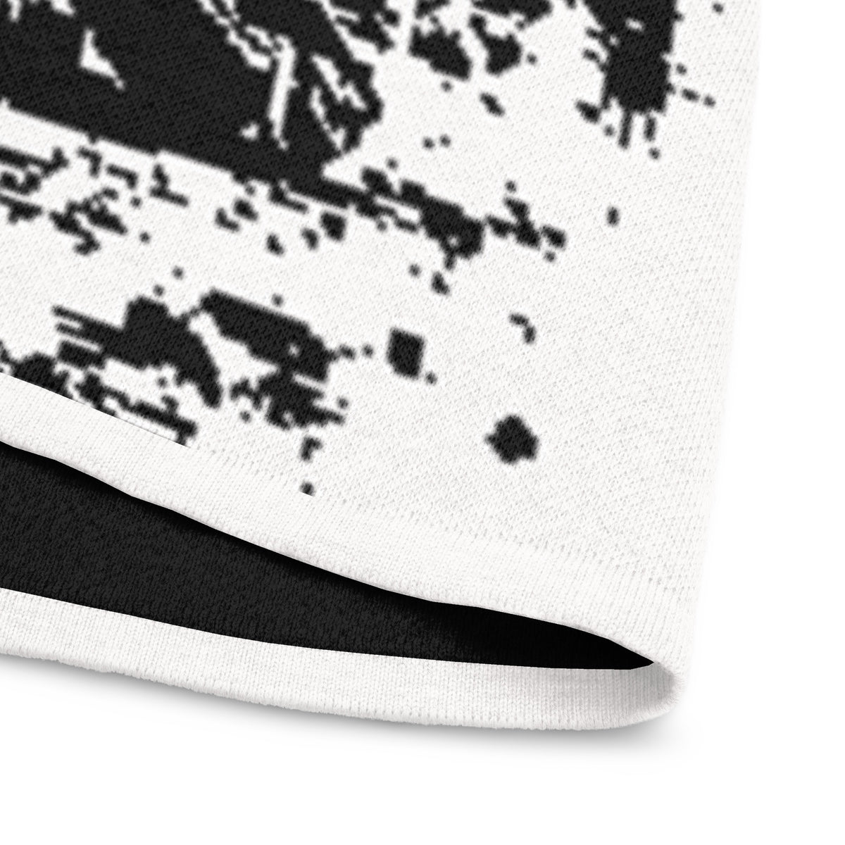 Gros plan sur la texture de la maille du t-shirt DZ Collection